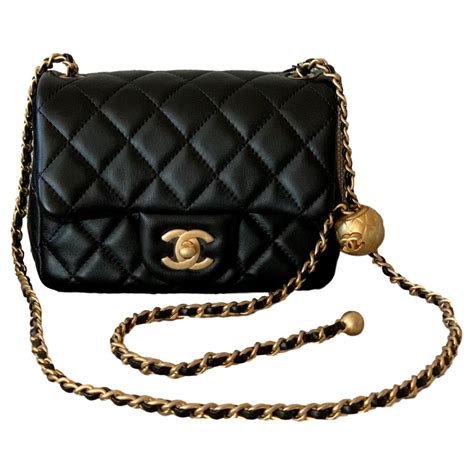 chanel black lambskin mini flap bag|Chanel mini flap price.